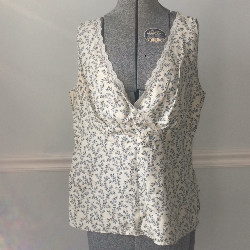 Cream top with blue flowers